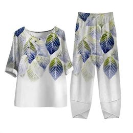 Kvinnors tvåbitar byxor Elegant Short Slve med lösa byxor Summer Casual Two Piece Set Flower Print Ladies Outfits O Neck Top High midjebyxor Hösten Y240426