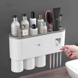 Toothbrush Holders Reverse toothbrush holder automatic dental pad dispenser wall mounted rack tool set magnetic adsorption 240426