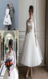 34 Long Sleeves Lace Wedding Dresses Cheap 2019 Scoop Neck Zipper Back Tea Length Tulle A Line Bridal Gowns6679328