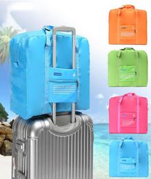 Storage Bags Fashion WaterProof Travel Bag Large Capacity Journey Duffle Women Nylon Folding Unisex Men Luggage Handbags Whole4230448