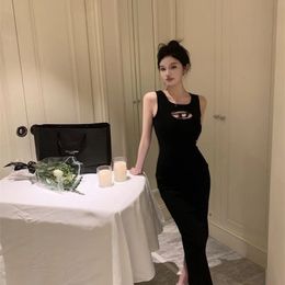 Hong Kong Spice Girl Black Metal Openwork Vest Dress Female Summer New Slim Slim Bag Hip Kjol Tide