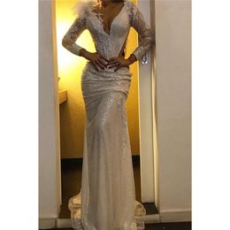 V Lace Neck Deep White Mermaid Prom Dresses Long Sleeves Applique Cutaway Feather Sweeptrain Formal Party Evening Gown For Black Girls