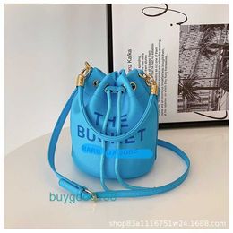 Luxury designer MioZj bucket bag Girls Spring Summer New Versatile Western style Water Bucket Bag Trendy One Shoulder Crossbody Letter Handbag