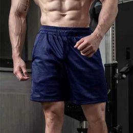Men's Shorts Mens mesh shorts breathable quick drying gym running shorts solid color daily sports shorts J240510