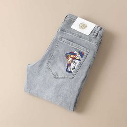 Designer di jeans maschili ricamato jeans maschila slim fit piccoli piedi primavera ed estate nuova tendenza elastica elastico gamba dritta lunghi pantaloni lunghi