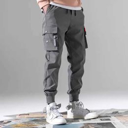 Men's Pants Rising in sports pants elastic waistband with drawstring and shrink cuffs mens sports pants multiple pockets solid color casual pantsL2404