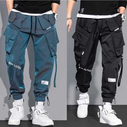 Pantaloni maschili pantaloni da carico alla moda hip hop pantaloni multi tascabili abbigliamento da strada per pantaloni sportivi solidi jogging maschile cotone trusersl2404