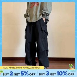 Men's Pants 2024 New Mens Overalls Multi Pocket American Hip Hop Pants Mens Ins Street Spring and Autumn Jumping Attack PantsL2404