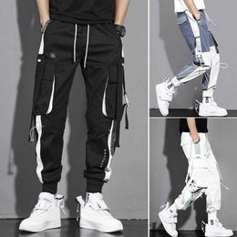 Men's Pants New 2024 mens casual mens street clothing high waisted cargo pants jogger version hip-hop harem pants casual mens clothingL2404