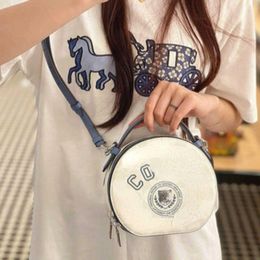 10A Fashion Shoulder White 2024 Cake New Round Designer Canteen Glacier College Women's Bags Varsity Bag Style Oxegm