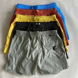 Designer high end foreign trade summer Stone youth casual metal nylon shorts Loose men's beach shorts Bird