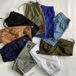 High-end foreign trade summer Stone youth casual metal nylon shorts loose men's beach pants 5 minute shorts Bird