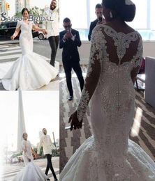 African Gorgeous Plus Size Wedding Dresses Lace Appliques Beaded Crystals V Neck Mermaid Bridal Dress Long Sleeves Bride Party Gow8563898