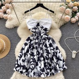 Casual Dresses Summer Vacation Style Floral Suspender Dress With Bow Tie And Waist Closure Sexy Skirt