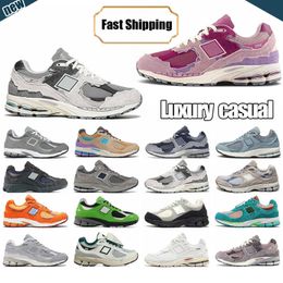 Designer Sneakers 2002r Running Shoes Athletic Womens Mens Casual Jogging Sneaker on Rain Cloud Pink Grey Brown 2024 suede eaay matching summer spring