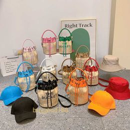 Luxury designer MioZj bucket bag Water Bucket Grass Woven Womens Bag 2024 Korean Edition Trendy Fashion Letter Shoulder