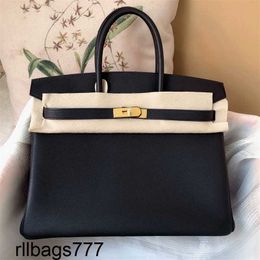 High Platinum Luxurys Handbag Leather End Quality Bag Litchi Texture Togo Bag Womens Lock Buckle Fashion Bag