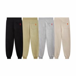 Calça casual calça casual marca de moda de moda Am Logipo bordado com coração vermelho solto de jogging solto para homens e mulheres de alta qualidade cintura plus size calça de moletom