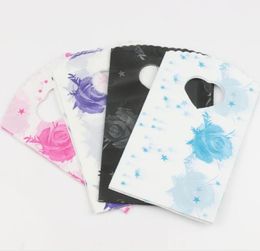 4Colors Pink Blue Black Purple Stars Rose Plastic Bag Jewellery Gift Pouches 15X9cm 400pcslot5579170