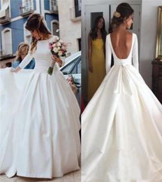 White Satin Ball Gown Wedding Dresses with Long Sleeves Bateau Neckline Draped Court Train Backless Plus Size Bridal Gowns Custom 7107331