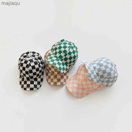 Caps Hats Spring and Summer Baby Hat Cartoon Smile Pattern Checkered Baseball Hat Childrens Boys and Girls Cotton Childrens Sun HatL240429