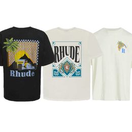 High Quality Original Rhuder Designer t Shirts Summer Coconut Tree Racing Kaleidoscope Playing Letter Logo High Street Loose Short Sleeve Couple t with 1:1 Logo