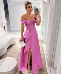 Elegant Long Pink Off Shoulder Prom Dresses with Ruffles/Slit A-Line Satin Pleated Floor Length Zipper Back Prom Dresses for Women