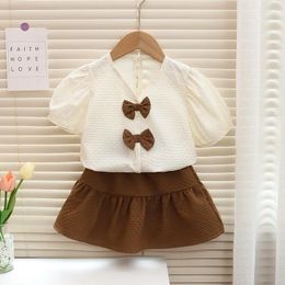 Clothing Sets Girls Sweet Bow T-shirts Summer Suit 2024 Baby Girl Casual Loose V-Neck Short-Sleeved Tops Cotton Skirts 2pcs