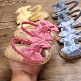 Sandalen Baby Sandalen Sommer Neugeborenes Mädchen Süßes Bogenknoten Baby Prinzessin flacher Boden Baby weicher Boden Anti Slip Erster Schritt Strand Freizeitschuhel240429