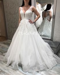 Elegant White A Line Wedding Dresses With Lace Sexy V Neck Open Back Bridal Dress 2024 Sweep Train Appliques Country Boho Bride Chic Civil Garden Vestios Novias