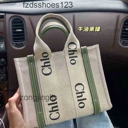 Woody Japanese outlet Summer Tote Canvas Leisure 2024 Bag Bags Designer Hands Cloee Totes Printed Letter Shopping Large Capacity Fashion Versatil XAZF