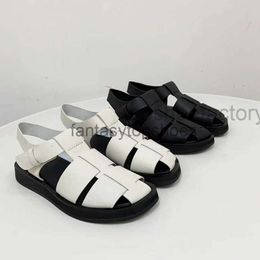 The Row simple TR crowd Small litchi grain cowhide flat Caligae woven round toe thick soled casual lace sandals