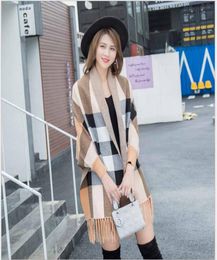 Whole Women039s Loose Poncho Plaid Sweaters Spring And Autumn Lady Tassel Poncho Cape Sweeaters Coat Larger Size Knitted C8340647