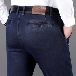 Jesienne jeanse i zimowe klasyczne Męskie Biznes Dżinsy ciemnoniebieskie proste elastyczność dżinsowe spodnie męskie marka gęsta pantswx