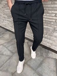 Pantaloni maschili per i dettagli della moda di moda in stile street style elastic welte jogger pantaloni casual casual leggero businessl2405