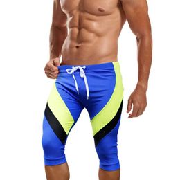 Men's Swimwear Brand swimwear mens sexy boxing shorts with pockets suitable for surfing and beach sports Q240429