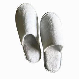 Wholesale of disposable white towels, travel hotels, slippers, spa shoes manufacturers