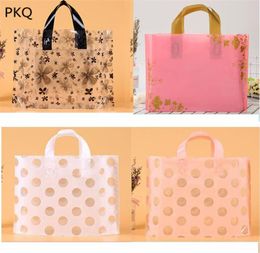 100pcs 35x25 Plastic Bags With Handles Gift Bag Colourful Flower Butterfly Clothes Packaging Boutique Handle Bags4558271