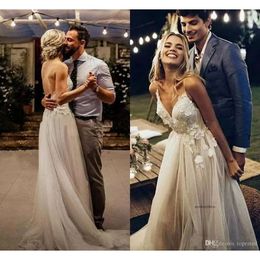 New Design Romantic Bohemian Boho Wedding Dresses Sexy V Neck Spaghetti Straps Sleeveless Garden Applique Backless Lace Beach Bridal Gowns 0430