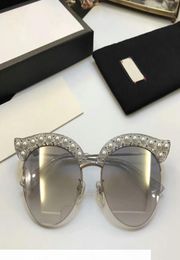 2020 New fashion sunglasses G0212 Charming sexy cat eye pearl rivets fashion women sunglasses for women womens sunglasses with box5454611