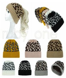 Women Leopard Knitted Ponytail Caps Fashion Criss Cross Ponytail Beanie Winter Warm Wool Casual Knitting Hat Party Hats Supply RRA3059128