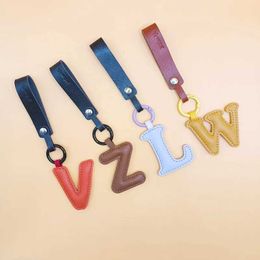 Keychains Lanyards Hot selling letters leather keychain bags phone cases keychain brackets friends family lovers keychains car luggage pendants gifts Q240429