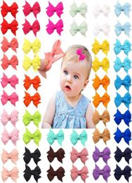 50 Pcslot 25 Colors In Pairs Baby Girls Fully Lined Hair Pins Tiny 2quot Hair Bows Alligator Clips For Little Girls Infants Tod2391542