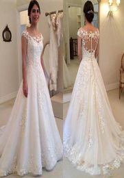 2022 Illusion Back Cap Sleeve Wedding Dress High Quality Sheer See Through Bridal Dresses with Lace Appliques Covered Buttons Vest4024163