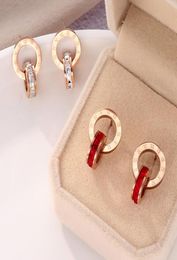 Charm Japan and South Korea new titanium steel non fading double ring Roman numeral red diamond white diamond studded Earrings fem4917090