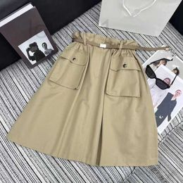 Skirts Designer Brand Summer New Pra Temperament Daily Commuting Elegant Style Patchwork Waistband Slimming Workwear Skirt for Women 5OWS