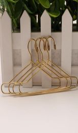 Whole 200pcs Doll Hangers 12CM Mini Gold Metal Hanger For Dolls Clothes Accessories SN26905840291