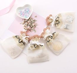 12pcs lots Gifts Bags Wedding Party Favours with Bowknot 10x4cm Jewellery Gift Package Pouch Christmas Return Gifts Candy Soap Bags246987342