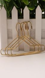 Whole 200pcs Doll Hangers 12CM Mini Gold Metal Hanger For Dolls Clothes Accessories SN26902136278