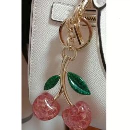 Designerin Cherry Keychain Marke Schlüsselkette Hang Ringhalter Designer Ehemann Heychains Geschenk Männer Frauen Auto Bag Anhänger Charmacm Accessoires Ornament Keychain